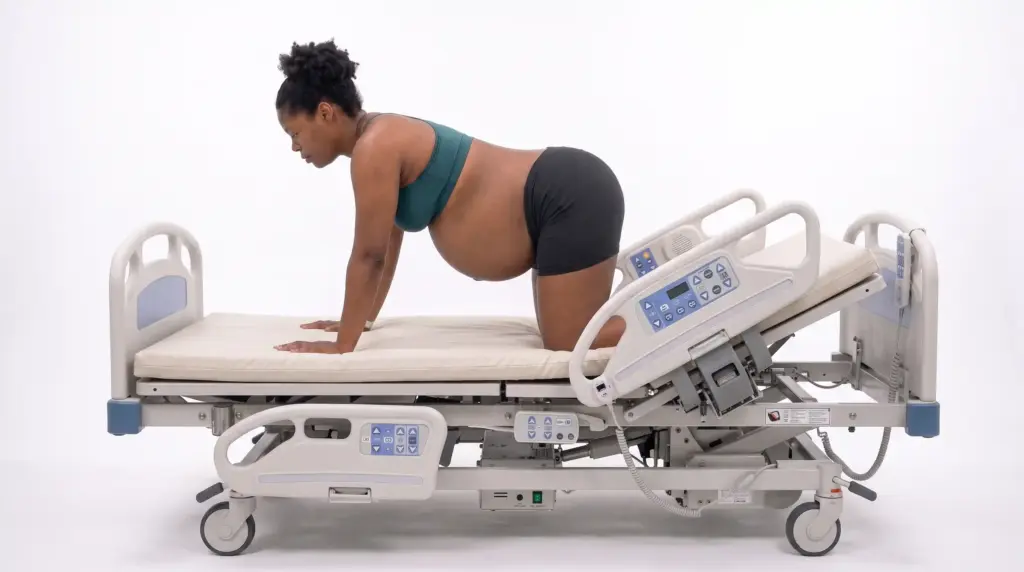 Woman using the hands-and-knees position during labor.